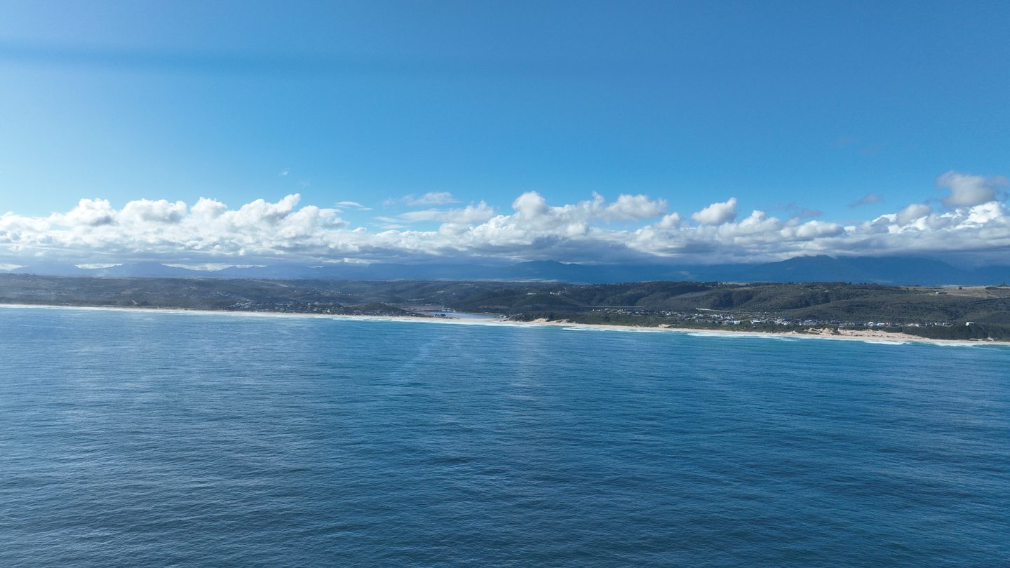 The bay at Tergniet with the Outeniqua mountains beyond, from the air